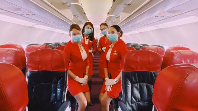 AirAsia Indonesia kru. dok. AirAsia. Liputan6. Dua Kali Seminggu, AirAsia Layani Penerbangan Internasional di Aceh, Padang dan Pekanbaru