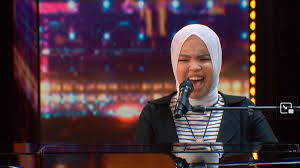 Aksi Putri Ariani mendapatkan golden buzzer di America's Got Talent. Foto: Dok. Twitter America's Got Talent. Konser Hitman David Foster and Friends, Putri Ariani Sepanggung Michael Bolton