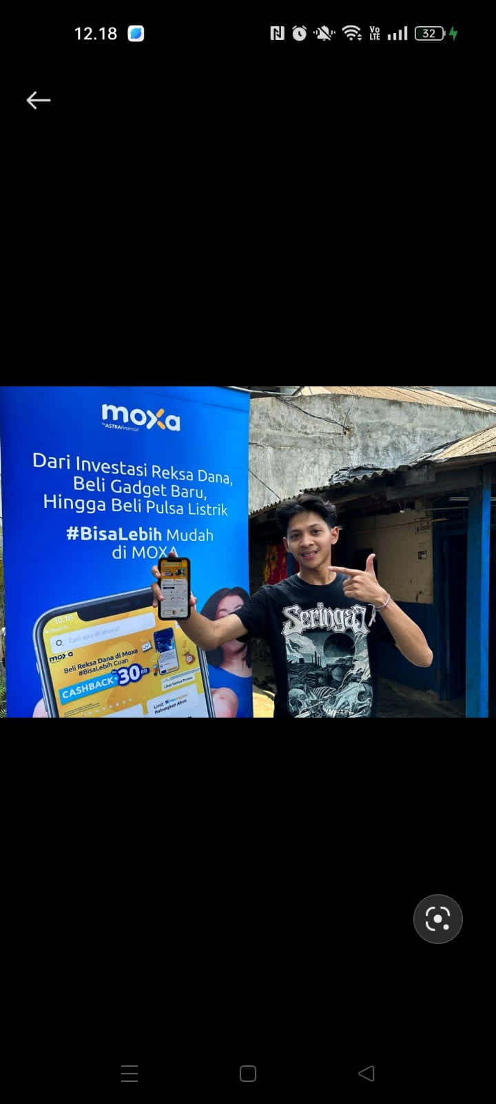 Juara 1 Permainan Ambil Emas Batangan, Ovan Tio menunjukkan aplikasi Moxa di sela acara serah terima 1 unit Motor Honda Beat setelah memenangkan Permainan Ambil Emas Batangan pada acara FIFGROUP 35th Localicious di Jakarta, Jumat (7/6/2024). dok. ist. FIFGROUP 35th Localicious, Juara Ambil Emas Batangan Terima Hadiah