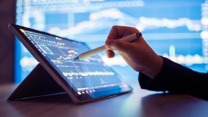 Ilustrasi saham - Foto: Getty Images/iStockphoto/Orientfootage Dampak Kebijakan Pemutihan Utang Terhadap Saham Perbankan