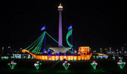 Ilustrasi kawasan Monas Jakarta pada suatu malam. Dok. Bukareview. Pemprov Jakarta Undang Warga Meriahkan Malam Tahun Baru 2025